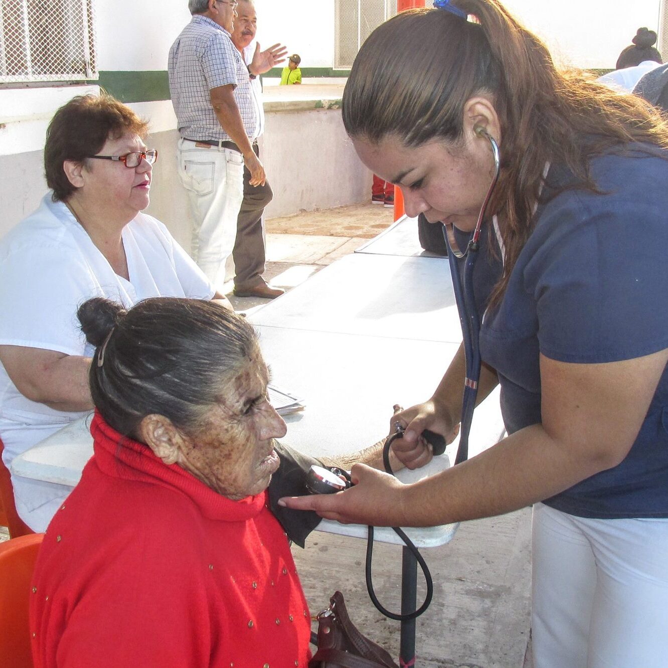Elderly patient receiving care.