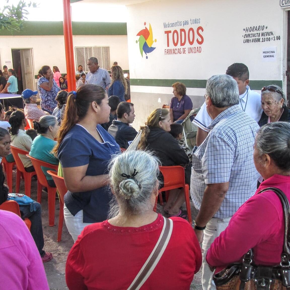 Area outside clinic buzzing with activity.