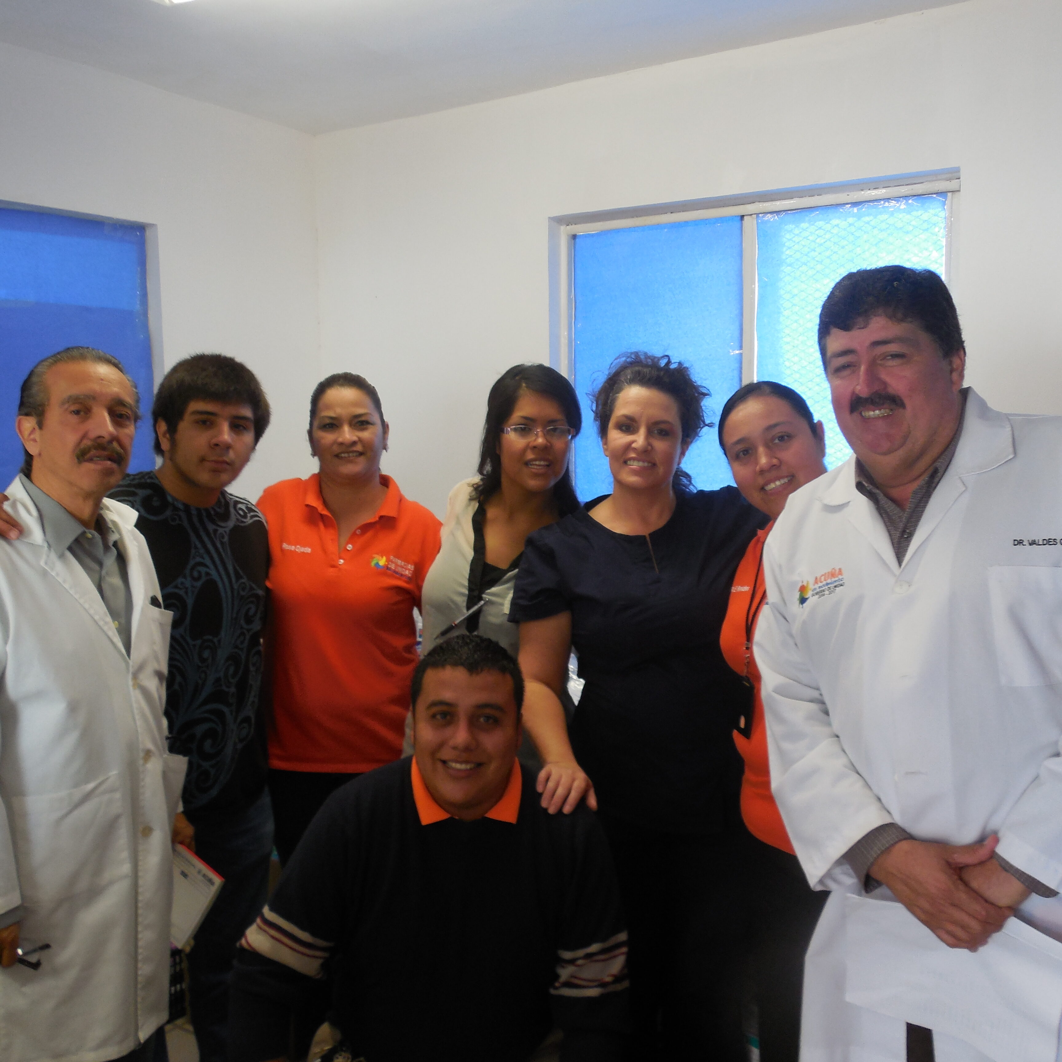 Doctors from Mexico and pharmacy staff