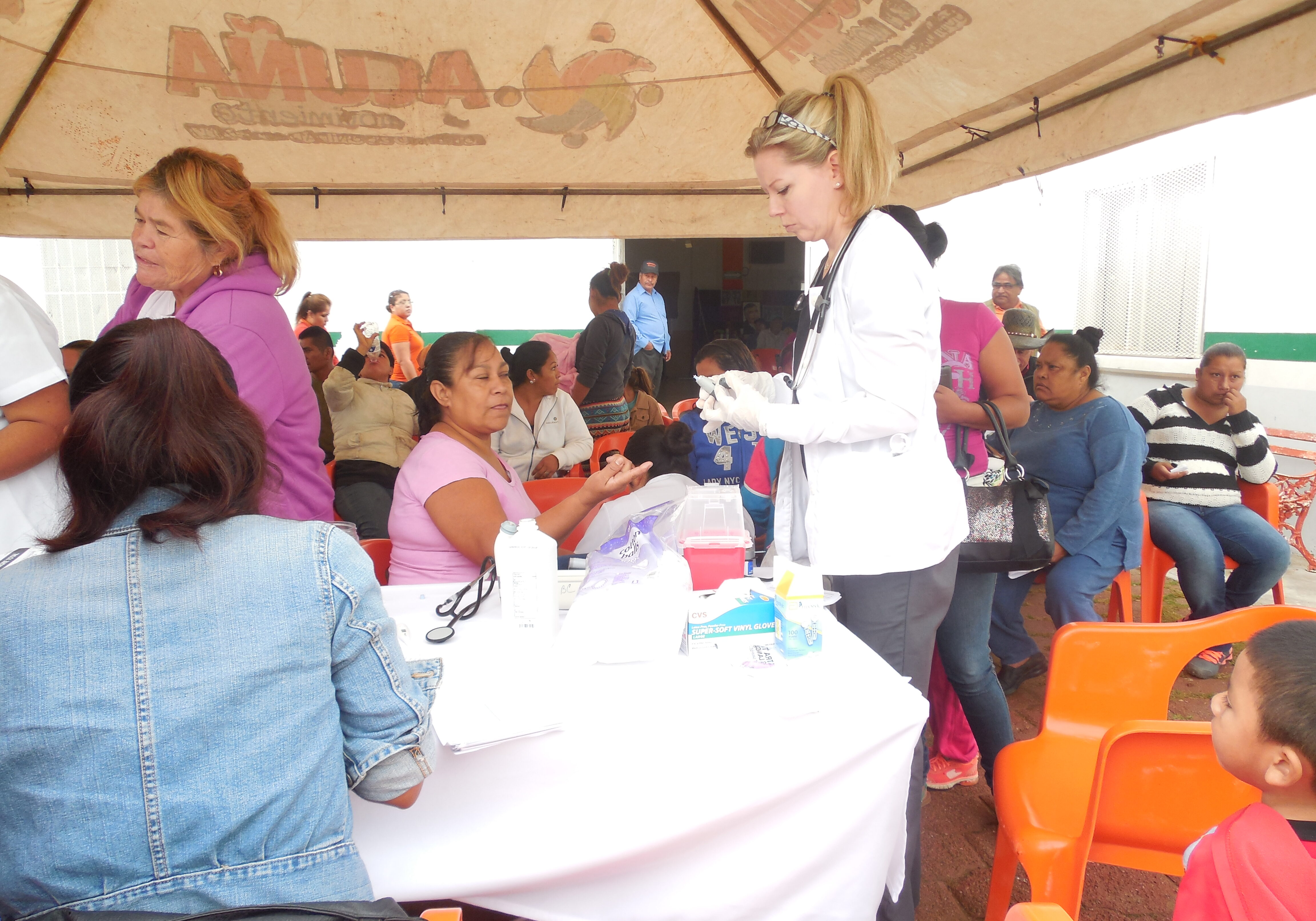 AMO Missy RN working clinic intake area