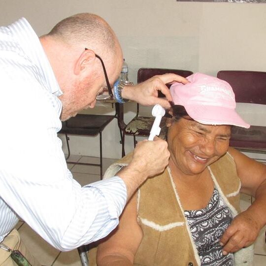 Dr. Lee examining patient