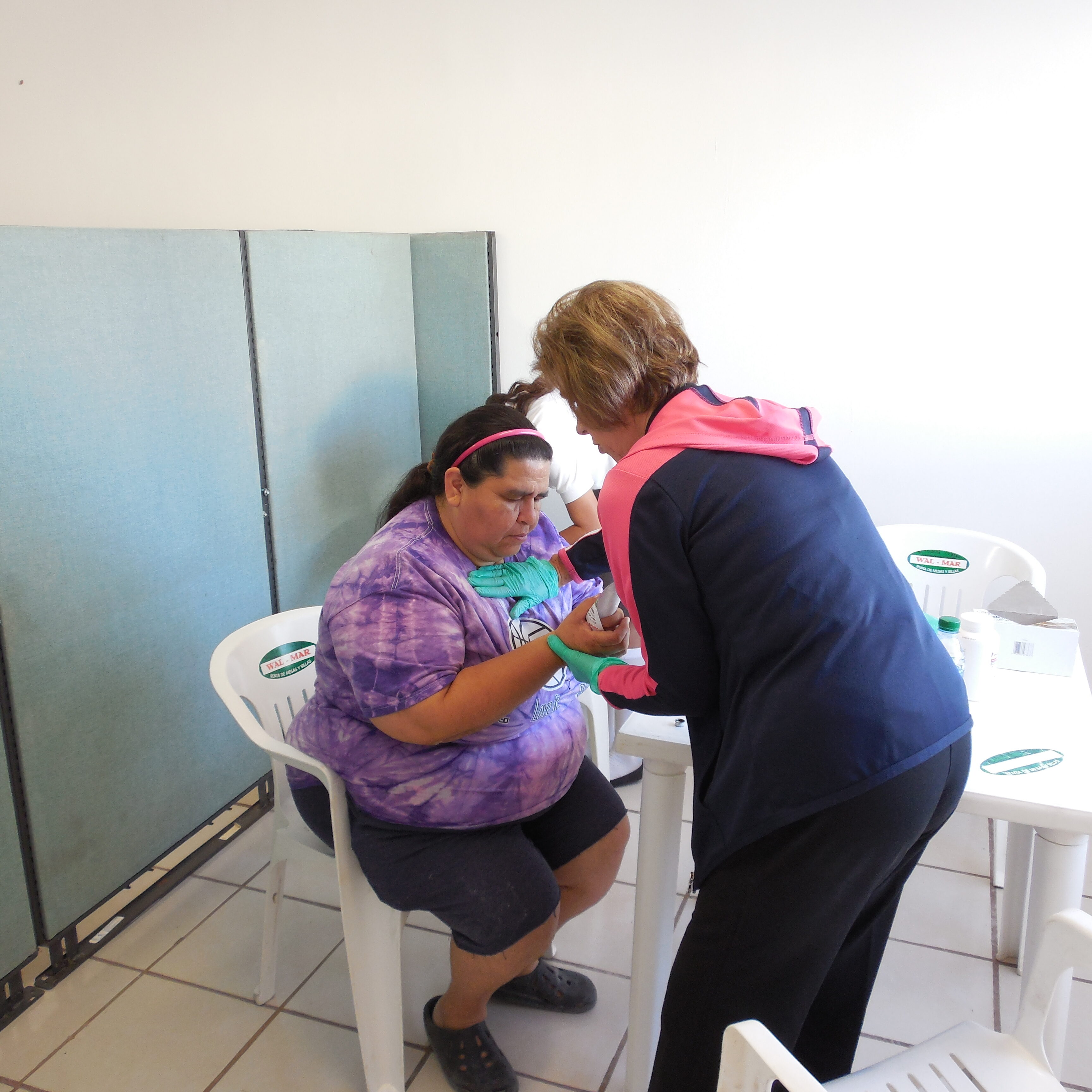 Acuña 2014 - Norma praying with patient