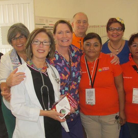 AMO Skoshi RN with pharmacy volunteers